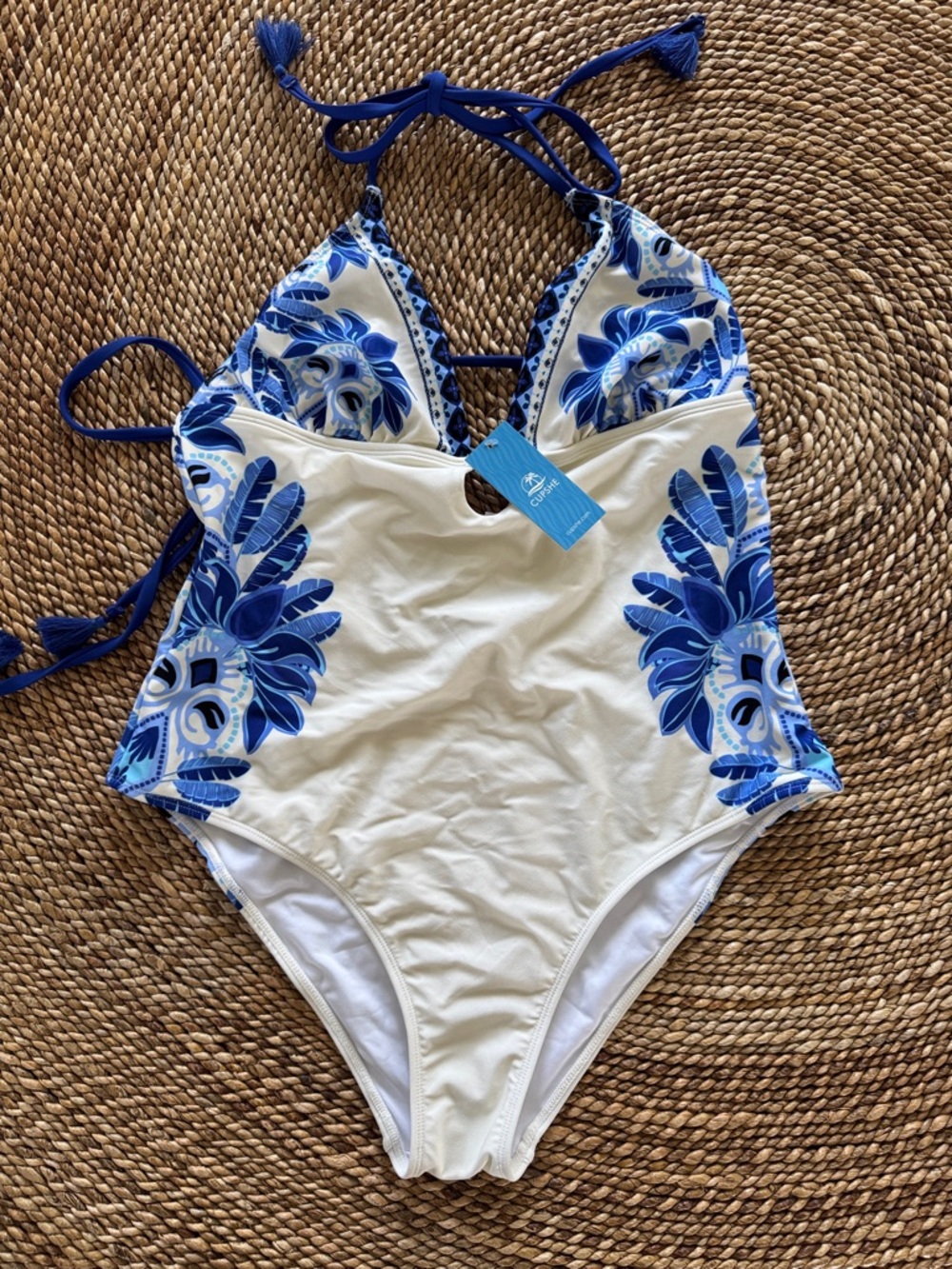 Woman’s One-Piece Swim Suit in White and Blue Floral